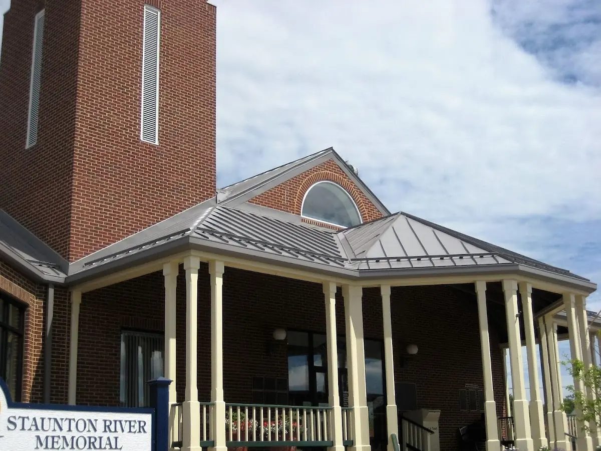 Skilled roofing craftsmen working on a residential roof in Bailey Hall